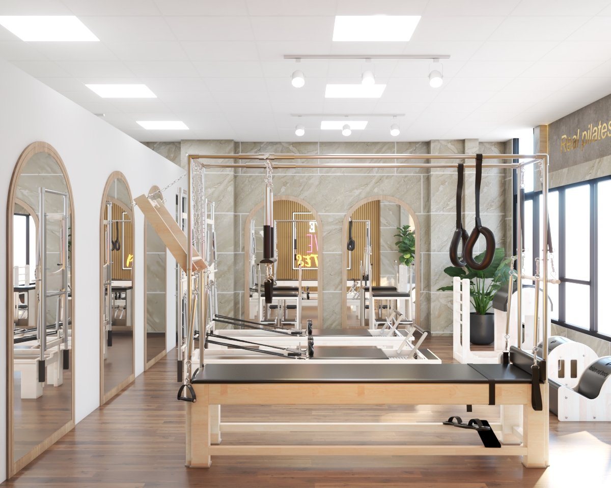 Studio quy mô lớn cần chia khu rõ: khu lớp nhóm, khu 1-1, khu apparatus và khu chờ — bố trí sai sẽ khiến âm thanh lớp này ảnh hưởng lớp kia.